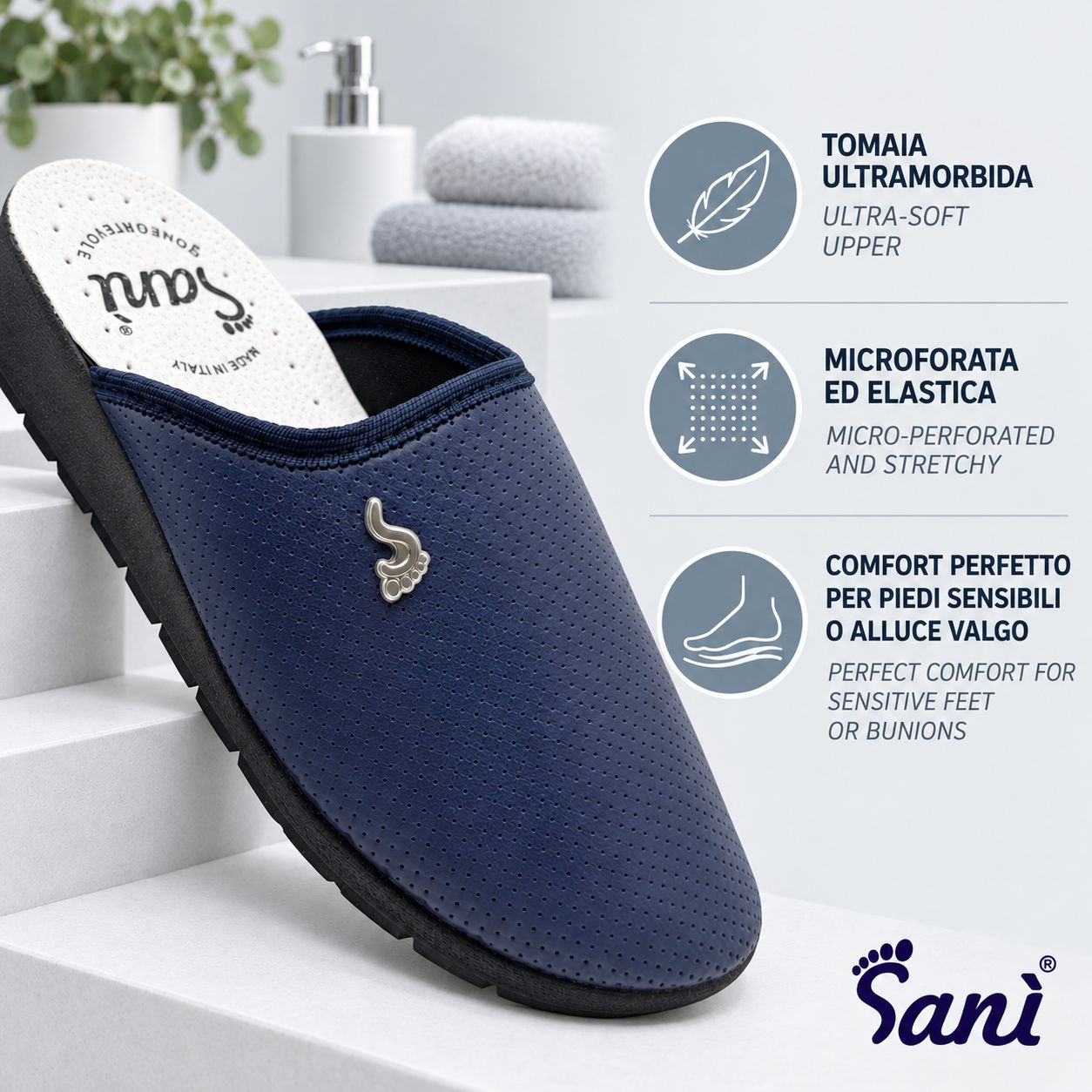 Zoccoli blu scuro, primo piano con icone testo: tomaia ultra-morbida, microforata ed elastica.