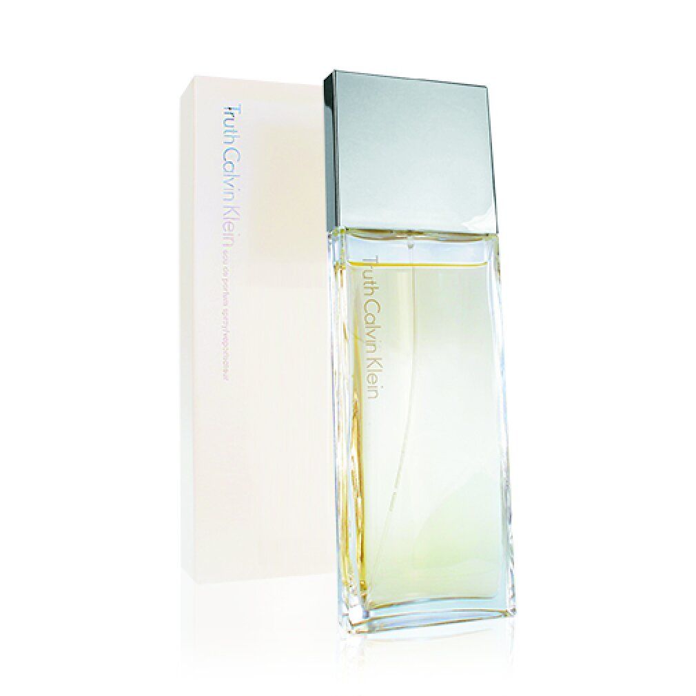 Flacone di profumo e confezione. Flacone rettangolare, trasparente. Confezione beige, rettangolare. Scritta: Truth Calvin Klein.