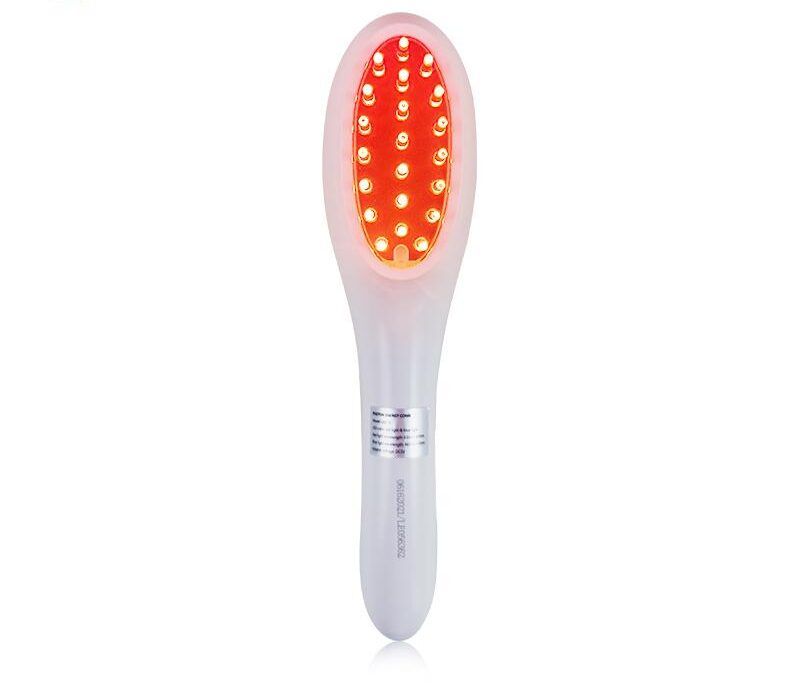 Dispositivo bianco con luci rosse. Testa ovale con manico. Dettagli argentati sul manico.