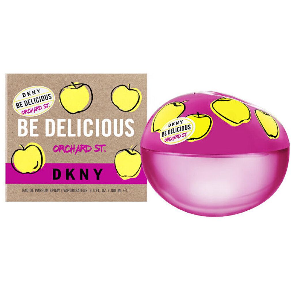 Flacone rosa e scatola. Illustrazioni di mele gialle sul flacone. Scritta: DKNY BE DELICIOUS ORCHARD ST. Stessa scritta sulla scatola.
