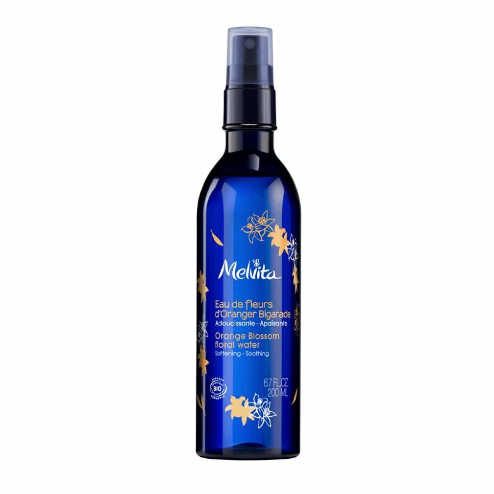 Flacone blu con vaporizzatore. Scritta: Melvita, Eau de fleurs d'Oranger, Orange Blossom floral water. Certificazione bio.