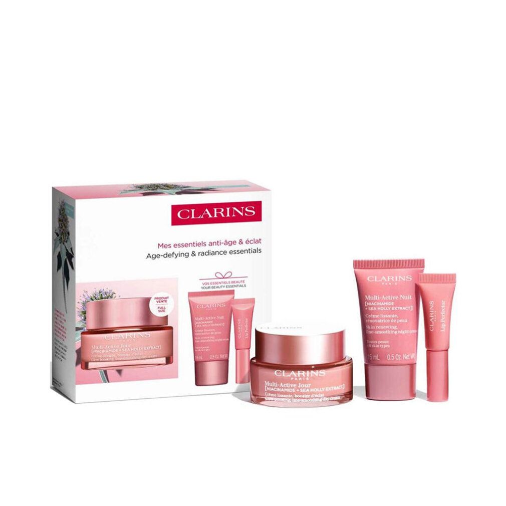 Set regalo con crema e tubetti rosa. Confezione con immagine del prodotto. Scritta Clarins.