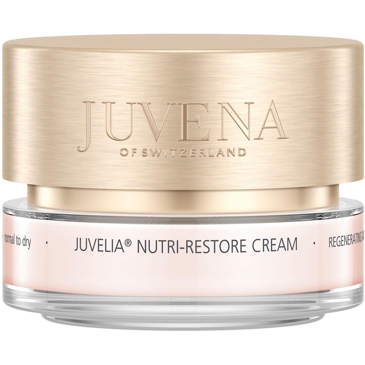 Vasetto di crema con coperchio dorato. Sul coperchio è scritto "JUVENA OF SWITZERLAND". Sotto c'è scritto "JUVELIA NUTRI-RESTORE CREAM".