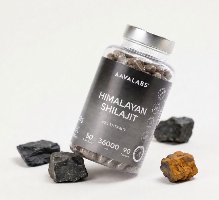 Contenitore di capsule Aavalabs Himalaya Shilajit con pietre.