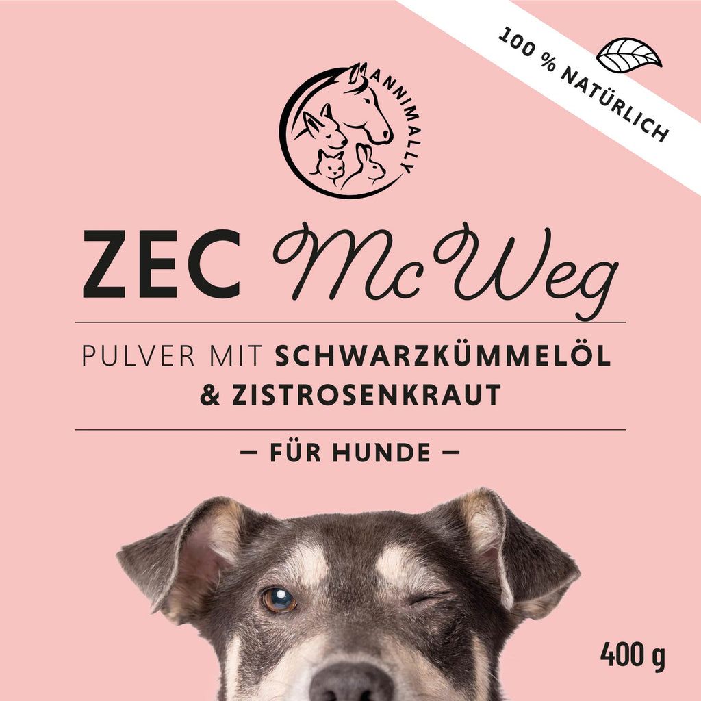 Etichetta rosa con testo: ZEC McWeg, polvere con olio di cumino nero e cisto - PER CANI -. Logo: Annimally. Sotto: cane che strizza l'occhio. 400 g.