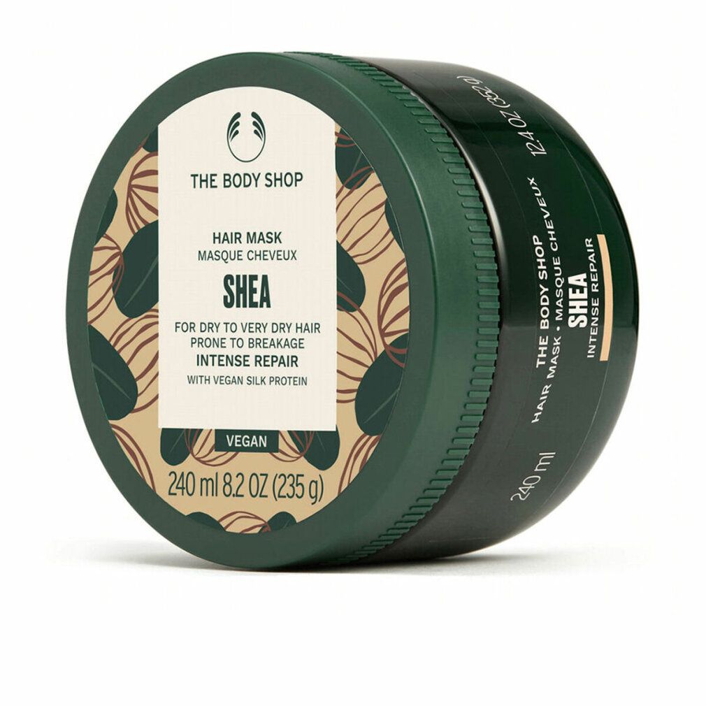 Barattolo verde con coperchio. Etichetta con informazioni sul prodotto: Shea Hair Mask, per capelli secchi. Vegano. 240 ml.