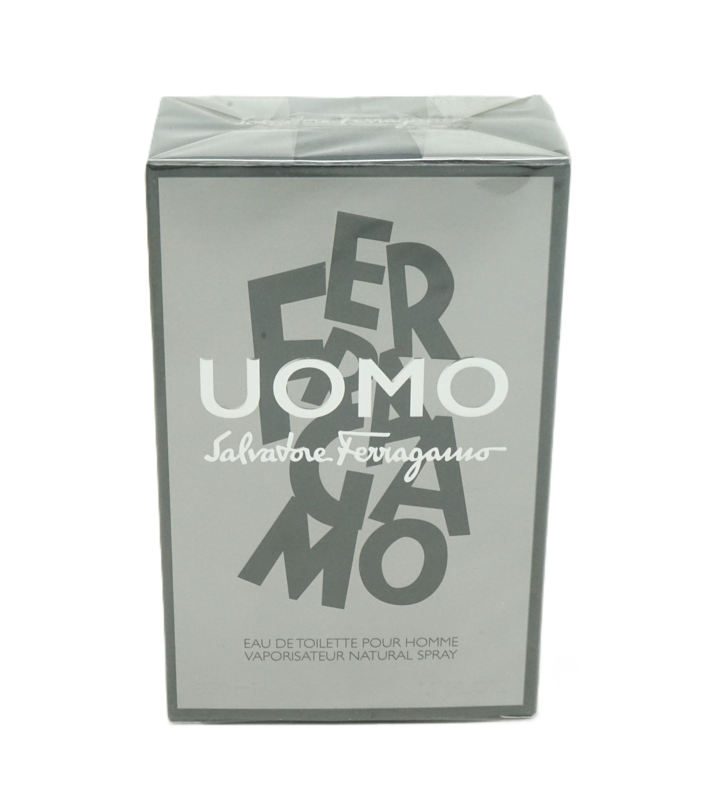 Scatola rettangolare grigia con la scritta UOMO Salvatore Ferragamo. Eau de Toilette Pour Homme.