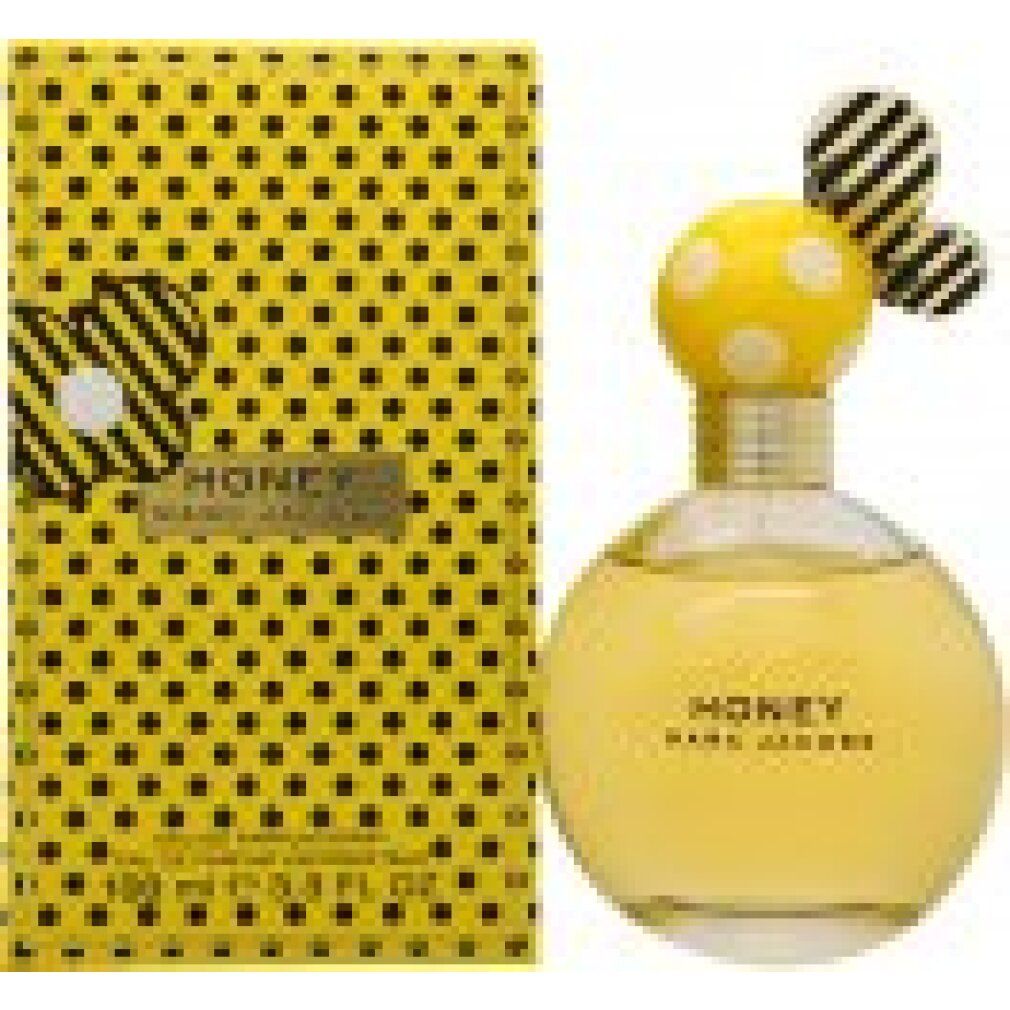 Scatola gialla a pois neri e flacone. Flacone con corpo giallo, pois bianchi e collo dorato. "HONEY" e "MARC JACOBS".