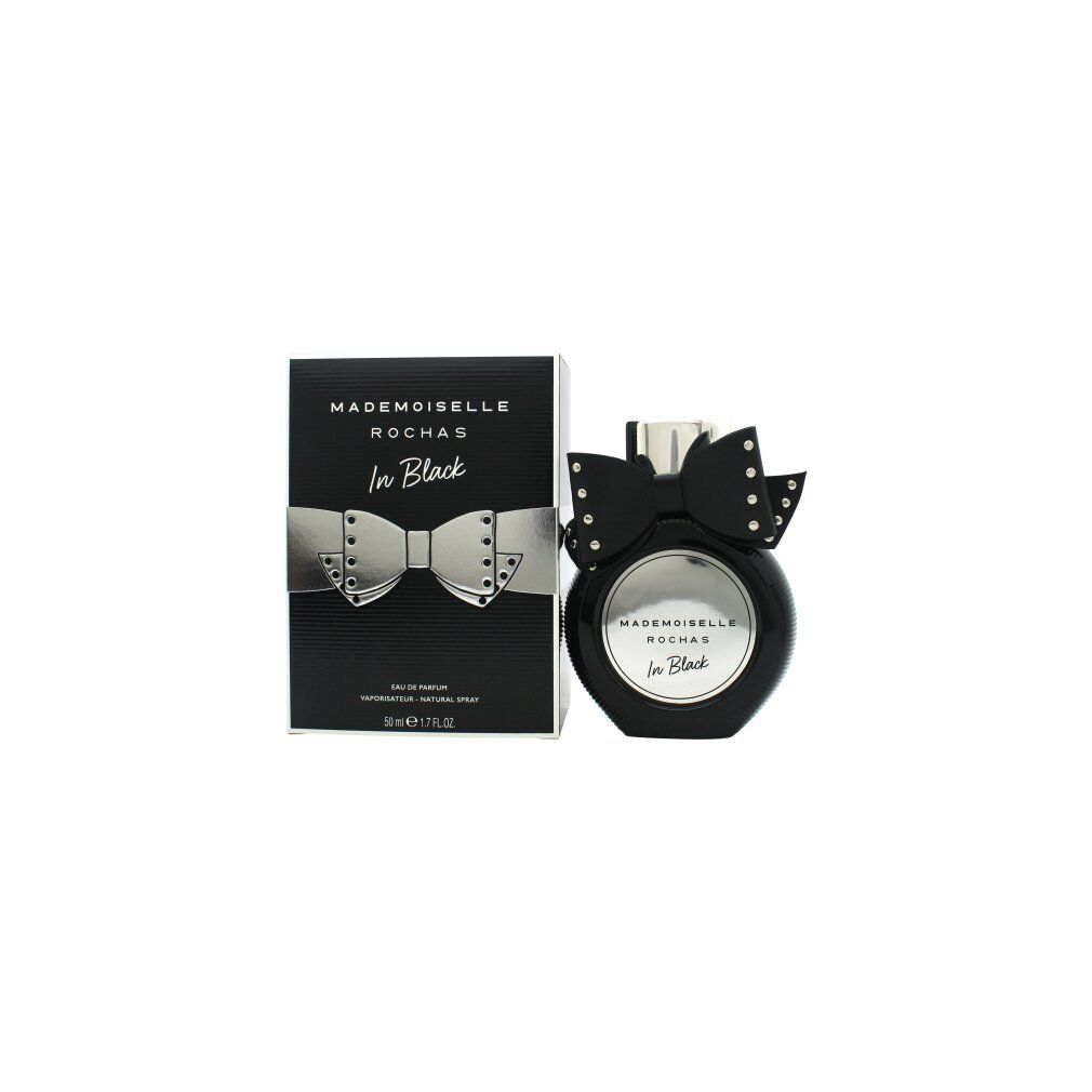 Flacone nero con fiocco e confezione. Scritta: Mademoiselle Rochas In Black. Fiocco argentato sulla confezione.