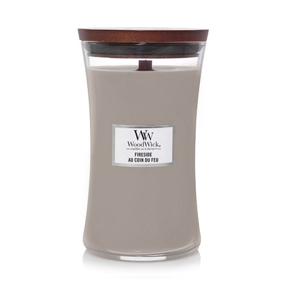 Candela in vetro con coperchio in legno. Etichetta con logo e scritta 'Fireside'.