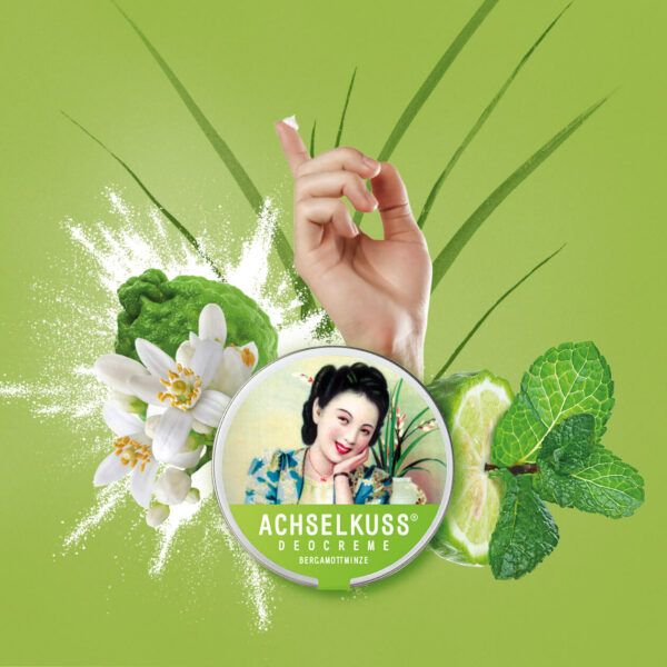 Scatola ACHSELKUSS Deocreme Bergamottminze con bergamotto, menta e una mano.