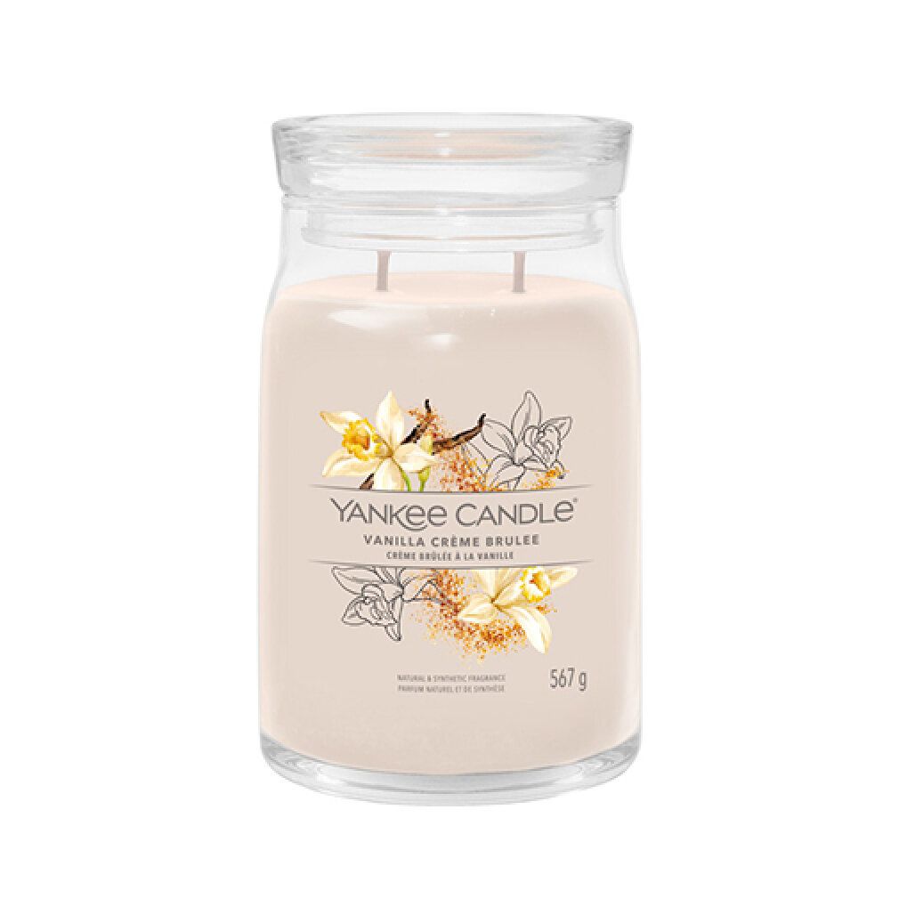Candela in barattolo di vetro con coperchio. Etichetta con fiori, nome prodotto e peso.