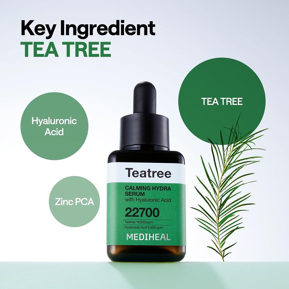 Flacone di siero con tappo nero. Scritte: Teatree Calming Hydra Serum, 22700, MEDIHEAL. Cerchi verdi con ingredienti.
