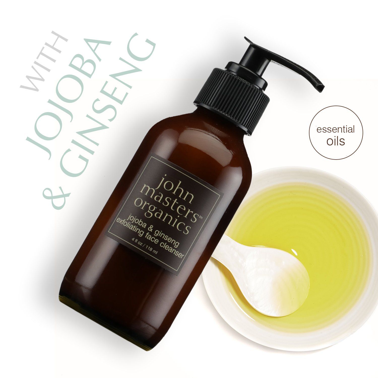 Flacone marrone con erogatore nero. Scritta: John Masters Organics. Accanto, una ciotola con liquido giallo e un cucchiaio.