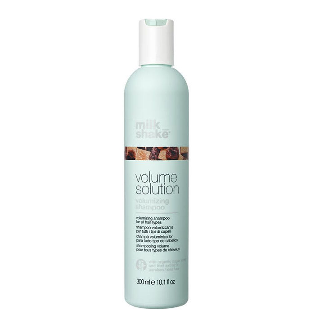 Flacone di shampoo verde chiaro con tappo bianco. Scritta Volume Solution, Milk Shake. 300 ml.
