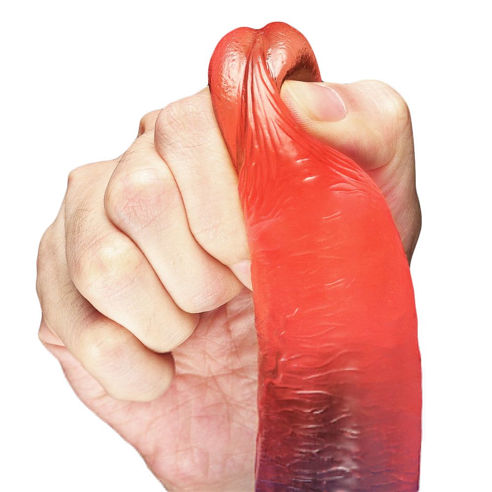 Mano che tiene un dildo bicolore. Testa rossa, corpo blu. Su sfondo bianco.