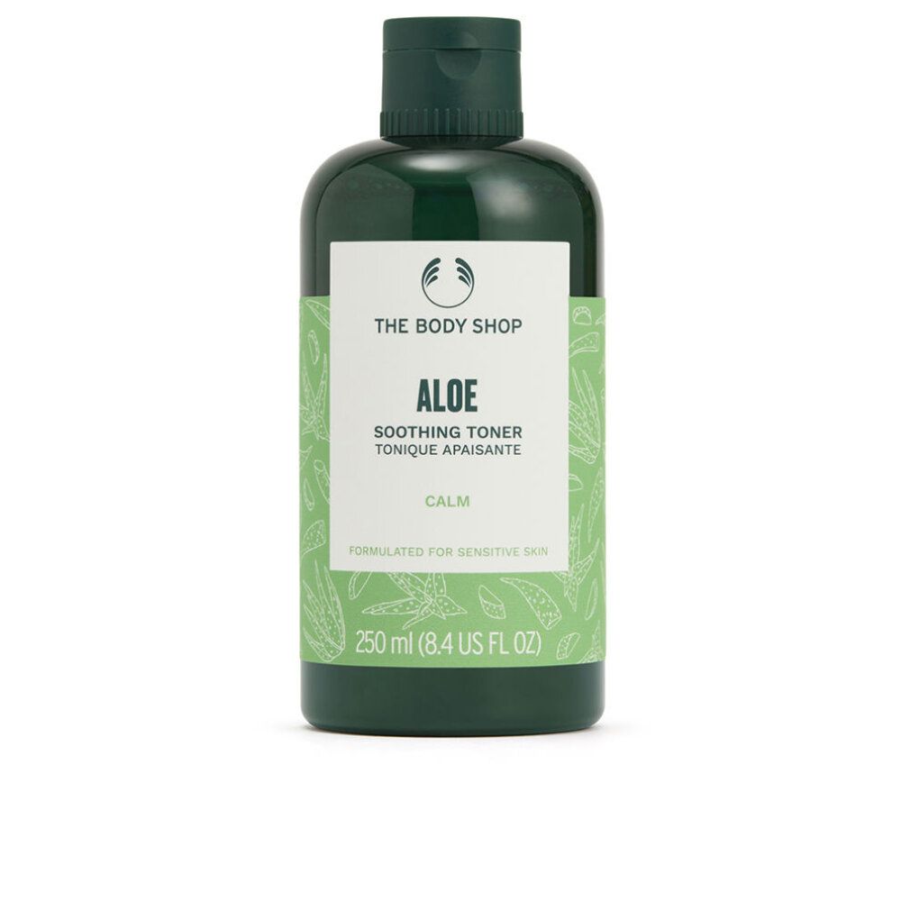 Flacone verde con etichetta bianca. Testo: Aloe, Soothing Toner, Calm. Marchio: The Body Shop. Per pelli sensibili.