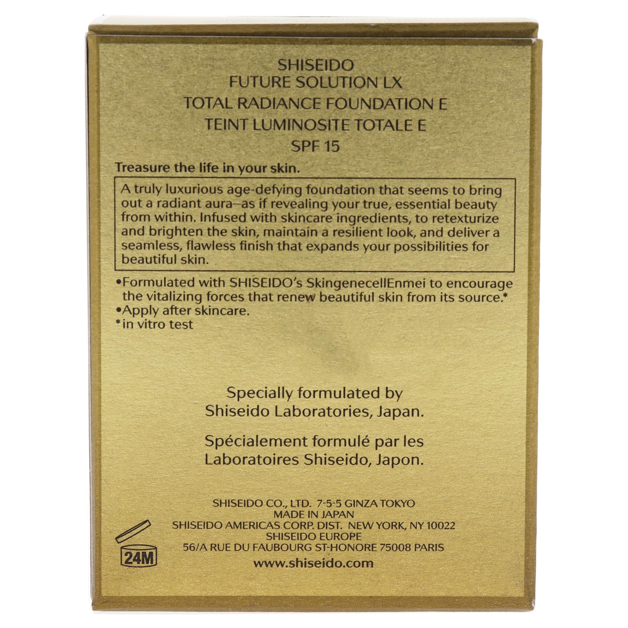 Retro della scatola dorata. Testo in inglese e francese. Informazioni sul prodotto, indirizzo del produttore, durata.