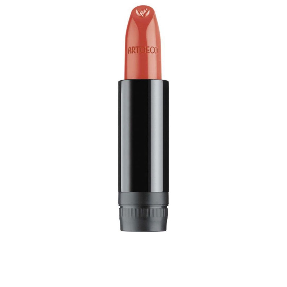 Ricarica rossetto. Rossetto arancione con astuccio nero. Il testo ARTDECO è visibile.
