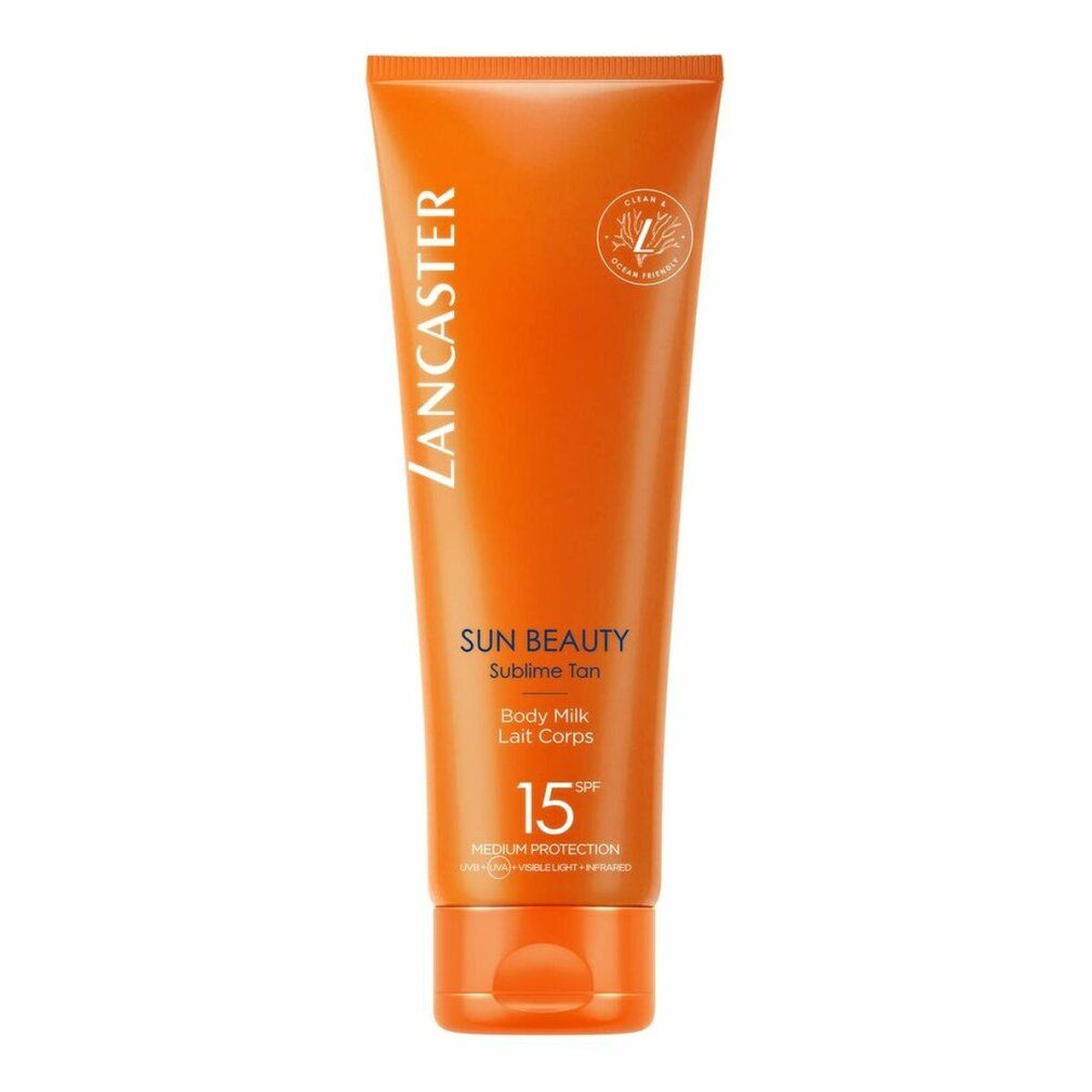 Tubo arancione di Lancaster Sun Beauty Sublime Tan Body Milk SPF15. Sigillo vegano. Testo: SPF15, Protezione media.