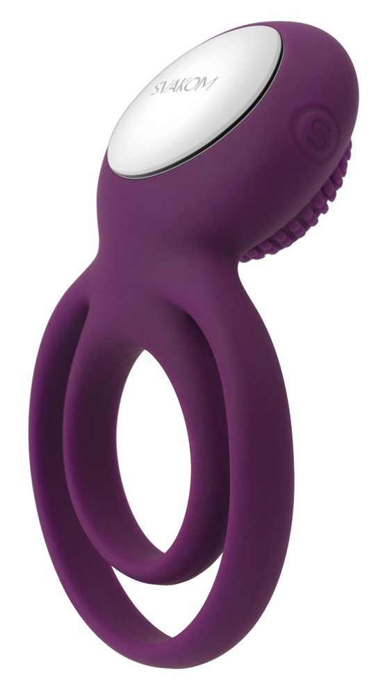Anello penieno viola con due anelli e stimolatore. Parte superiore con borchie e pulsante argentato. Logo SVAKOM.