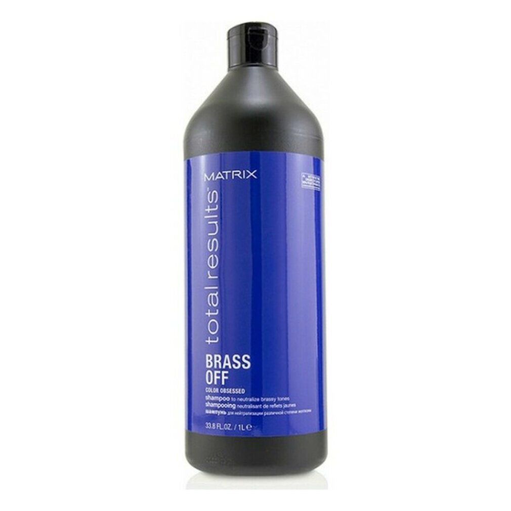 Flacone di shampoo blu con tappo nero. Scritta: Matrix Total Results Brass Off. 1L.