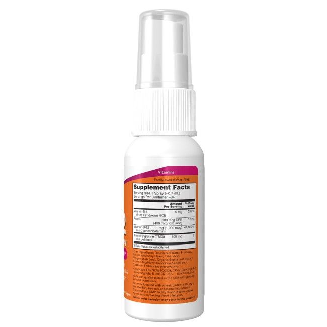 Flacone spray bianco con etichetta arancione. Testo: Vitamina B-12, Supplement Facts. Contiene informazioni nutrizionali.