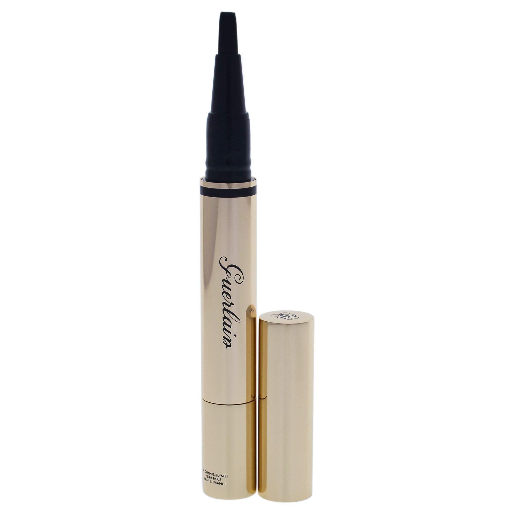 Illuminatore Guerlain Precious Light, corpo dorato, punta nera, cappuccio accanto. Testo: Guerlain.