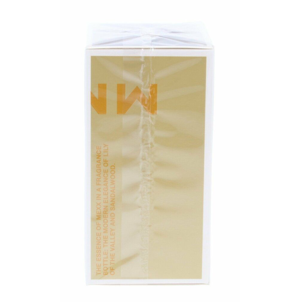 Confezione di MEXX Woman Eau de Toilette. Scatola bianca con sfondo dorato e testo.