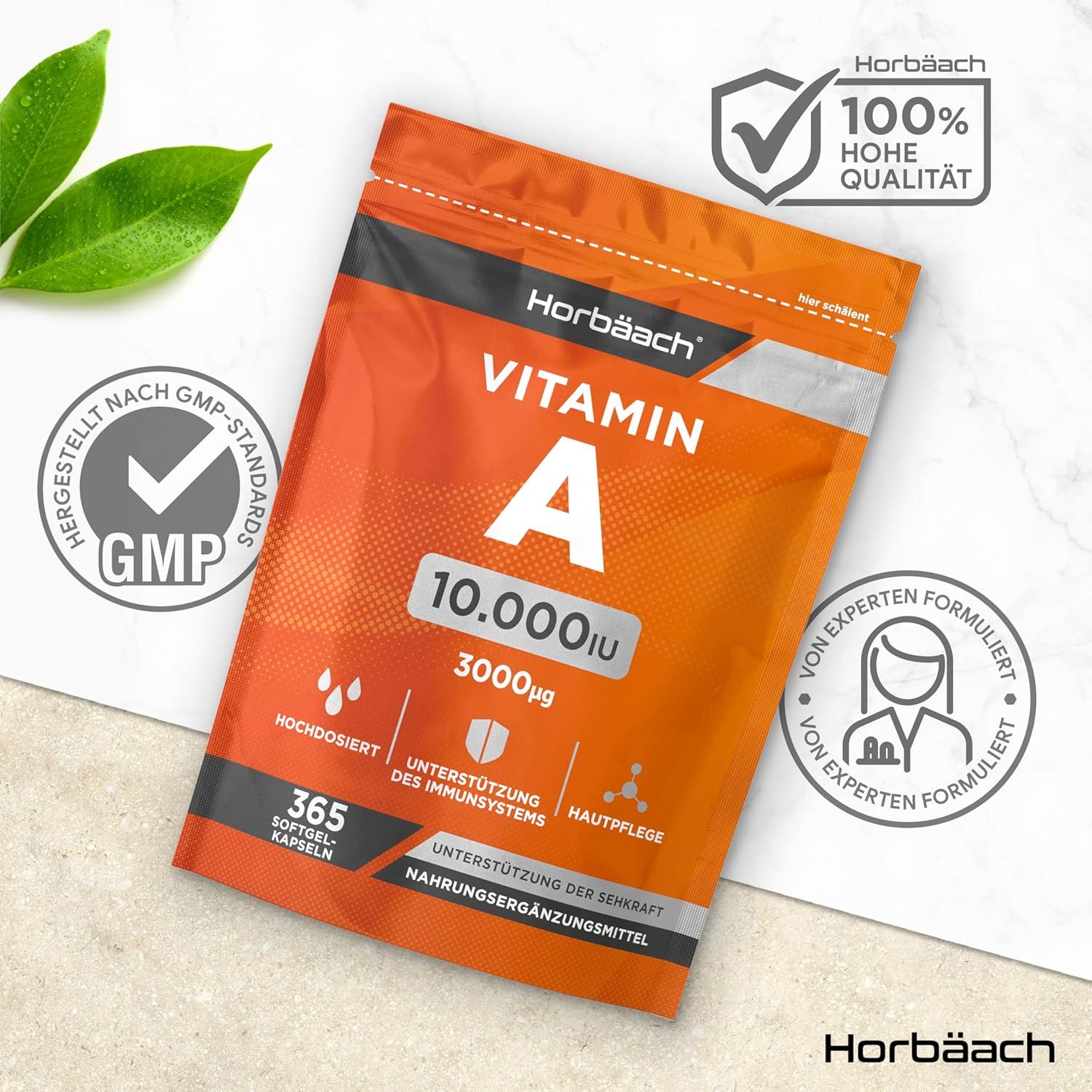 Confezione arancione con capsule di vitamina A 10.000 UI. Testo: ad alto dosaggio, supporto immunitario, cura della pelle, 365 capsule molli. Sigillo GMP.