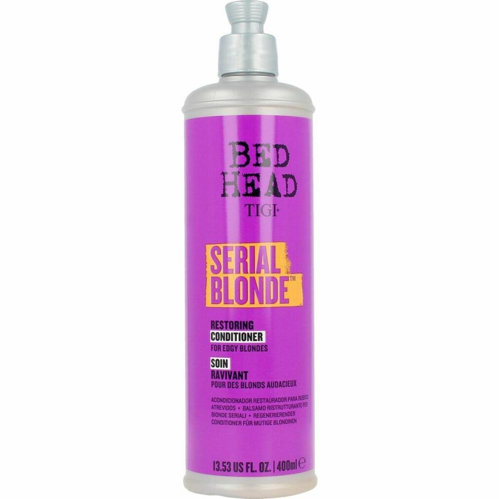 Flacone viola con tappo argentato. Scritta: Bed Head Tigi Serial Blonde. Restoring Conditioner.