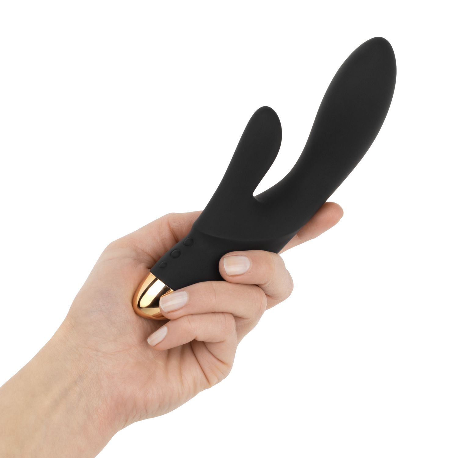 Vibratore a coniglio nero con punta dorata, tenuto in mano.