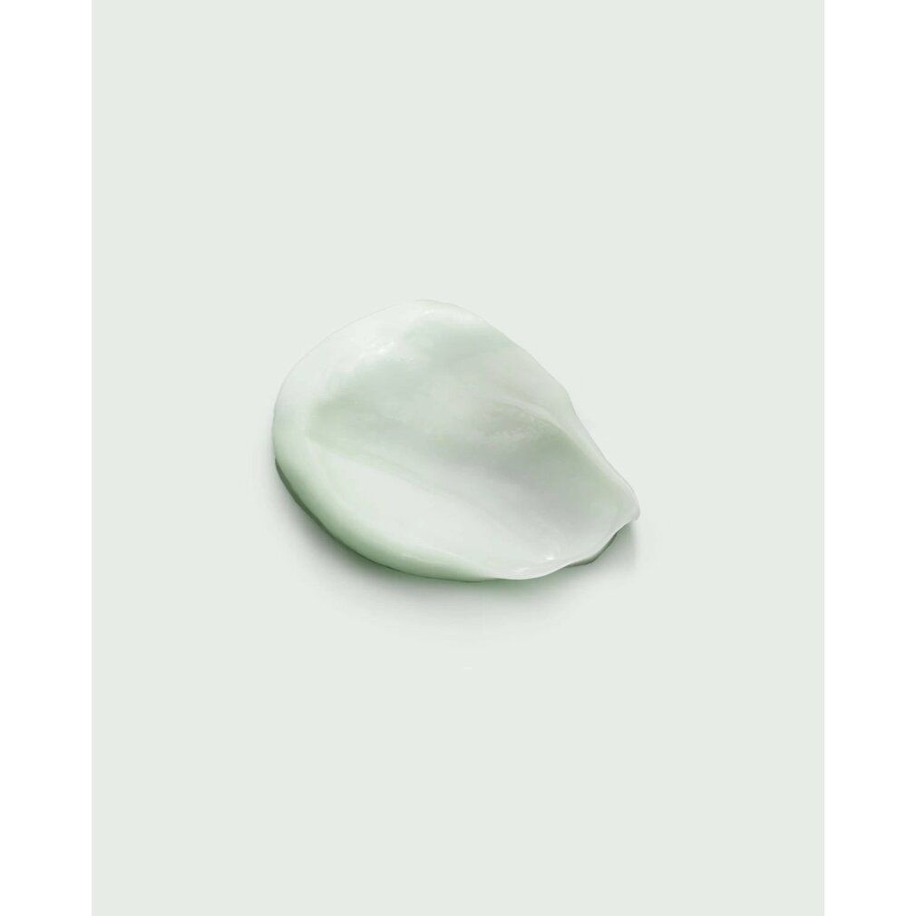 Macchia di crema chiara. Nessun imballaggio visibile.