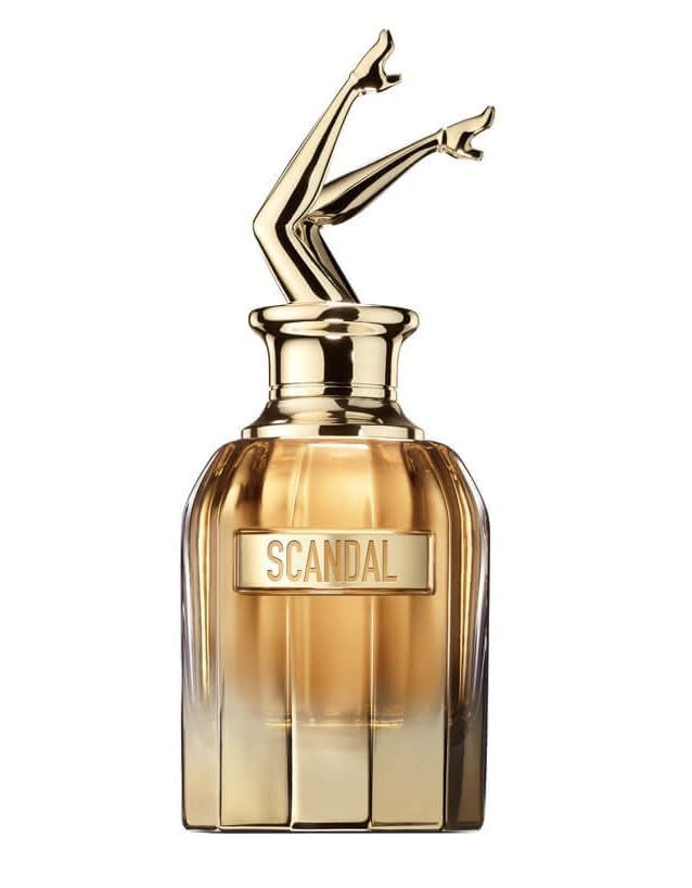 Flacone dorato con scritta "SCANDAL" e tappo a forma di gambe. Tonalità dorata.