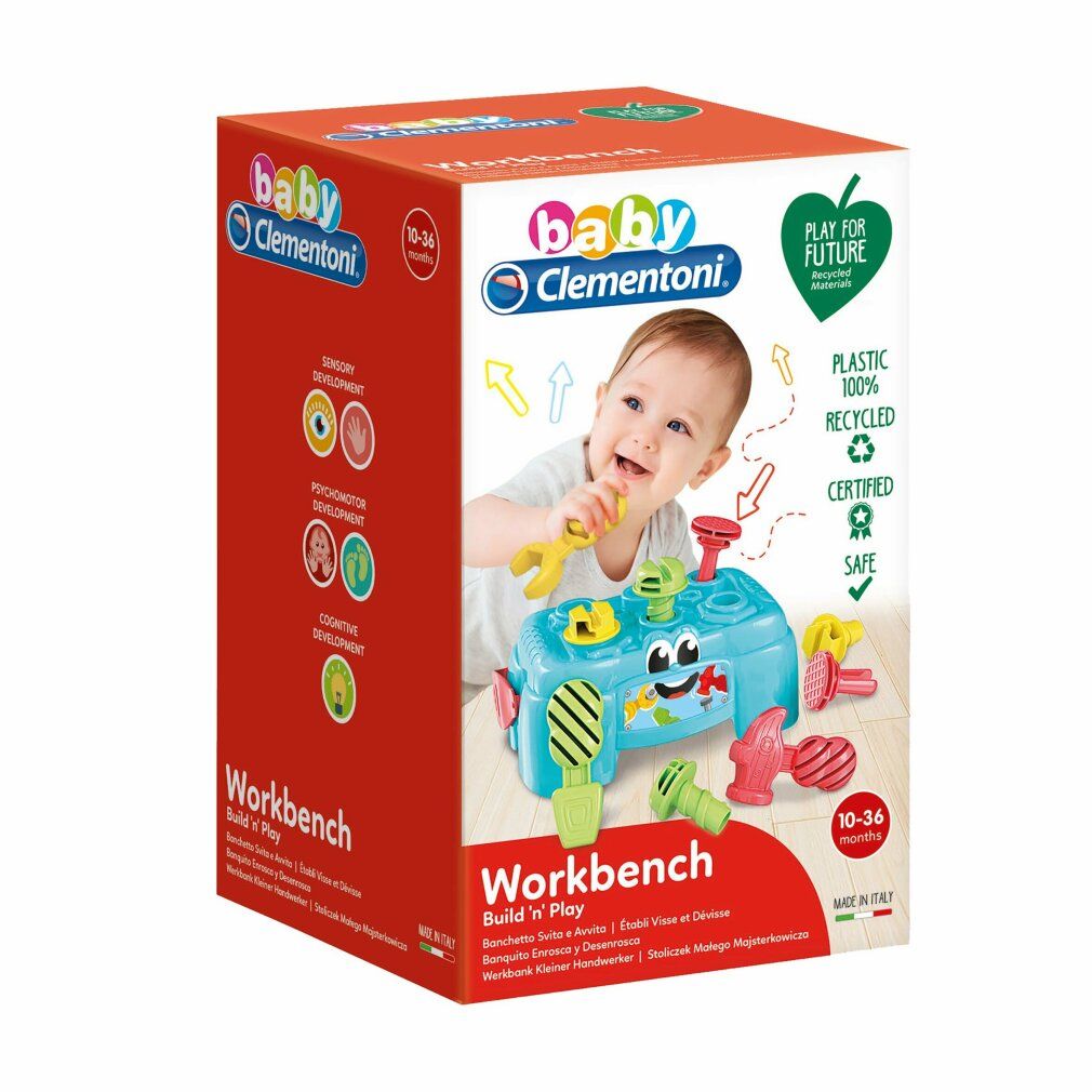 Confezione del banco da lavoro Baby Clementoni. Contiene banco, attrezzi e viti. Età consigliata: 10-36 mesi.