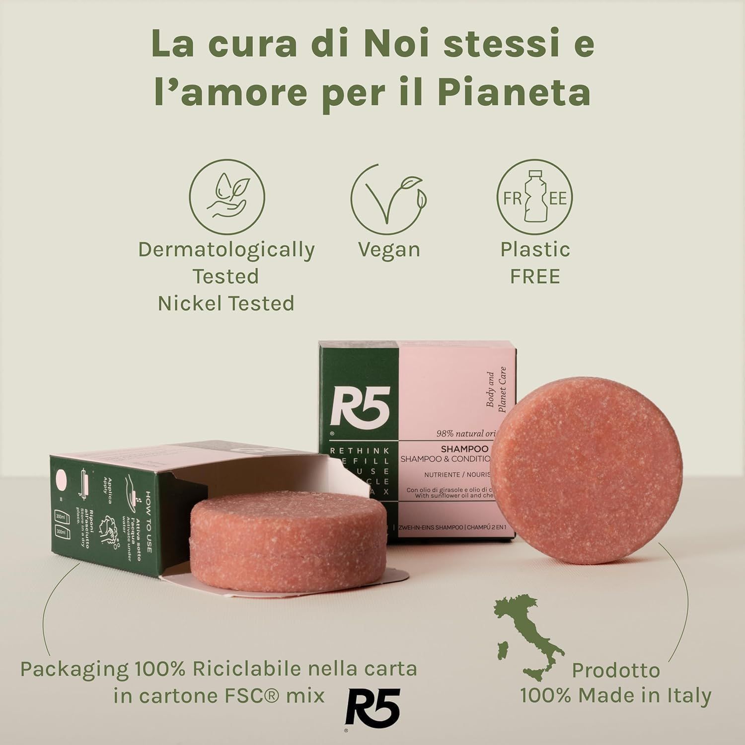 Shampoo solido rosa rotondo e confezione. Testo: Dermatologicamente testato, Vegan, Senza plastica. Logo R5. Made in Italy.