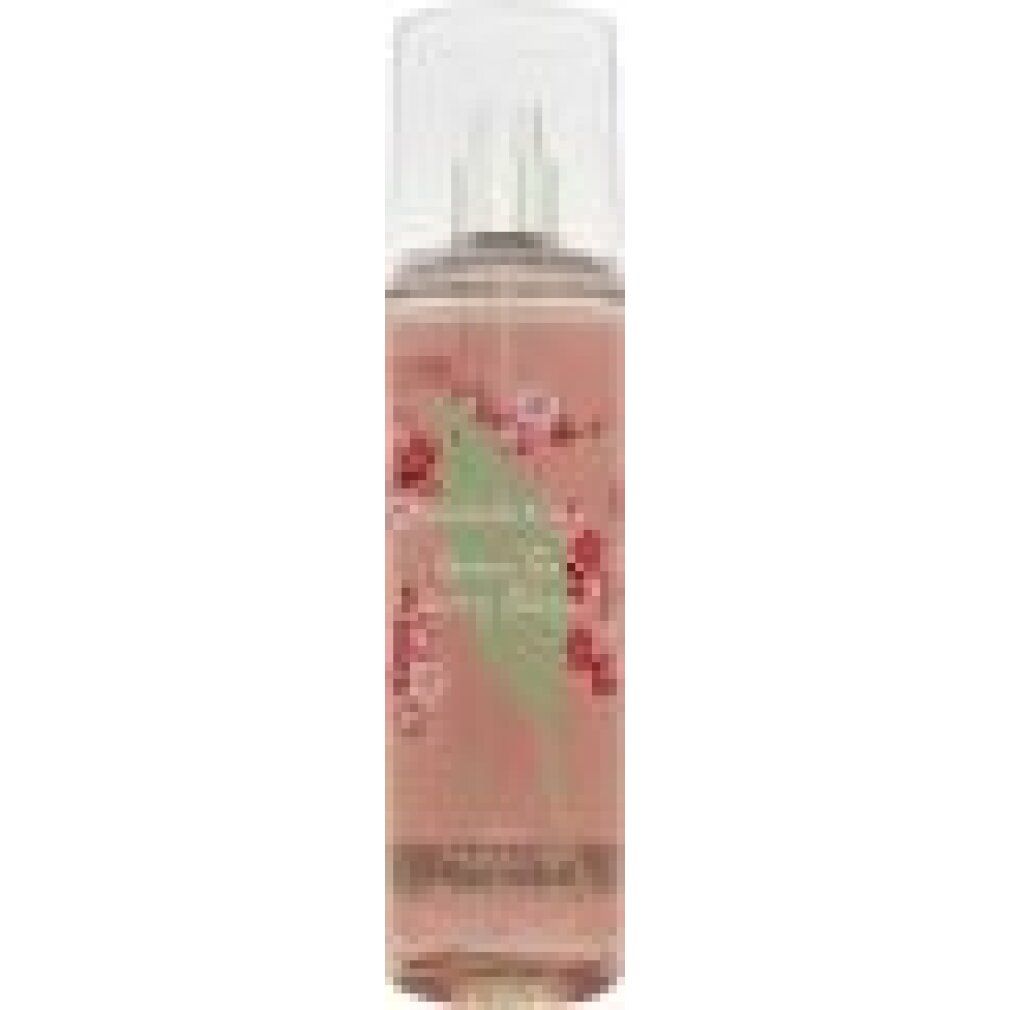 Flacone cilindrico con vaporizzatore e tappo trasparente. Liquido rosa, etichetta con fiori e testo.