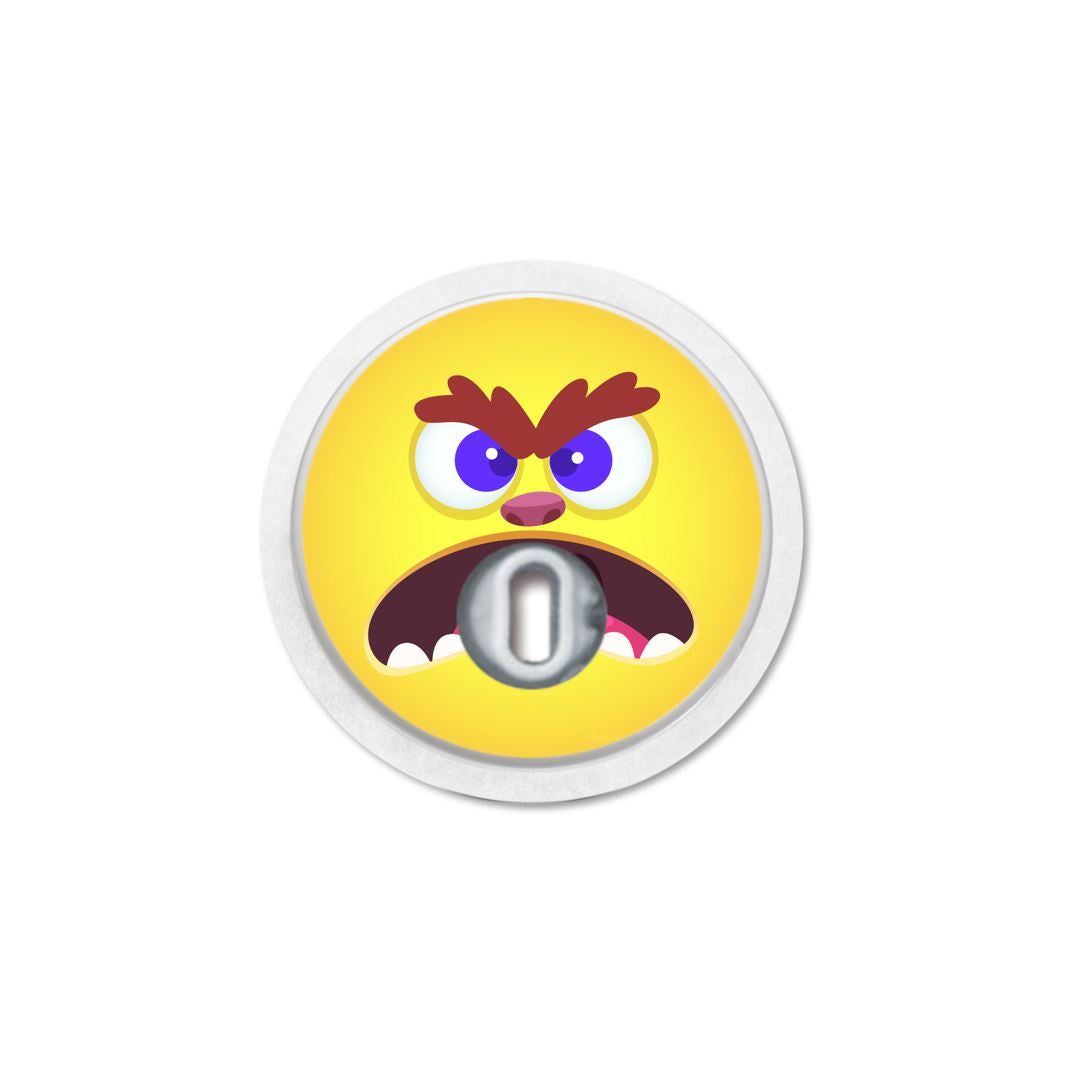 Adesivo rotondo giallo con faccia di mostro. Apertura centrale. Bordo bianco.