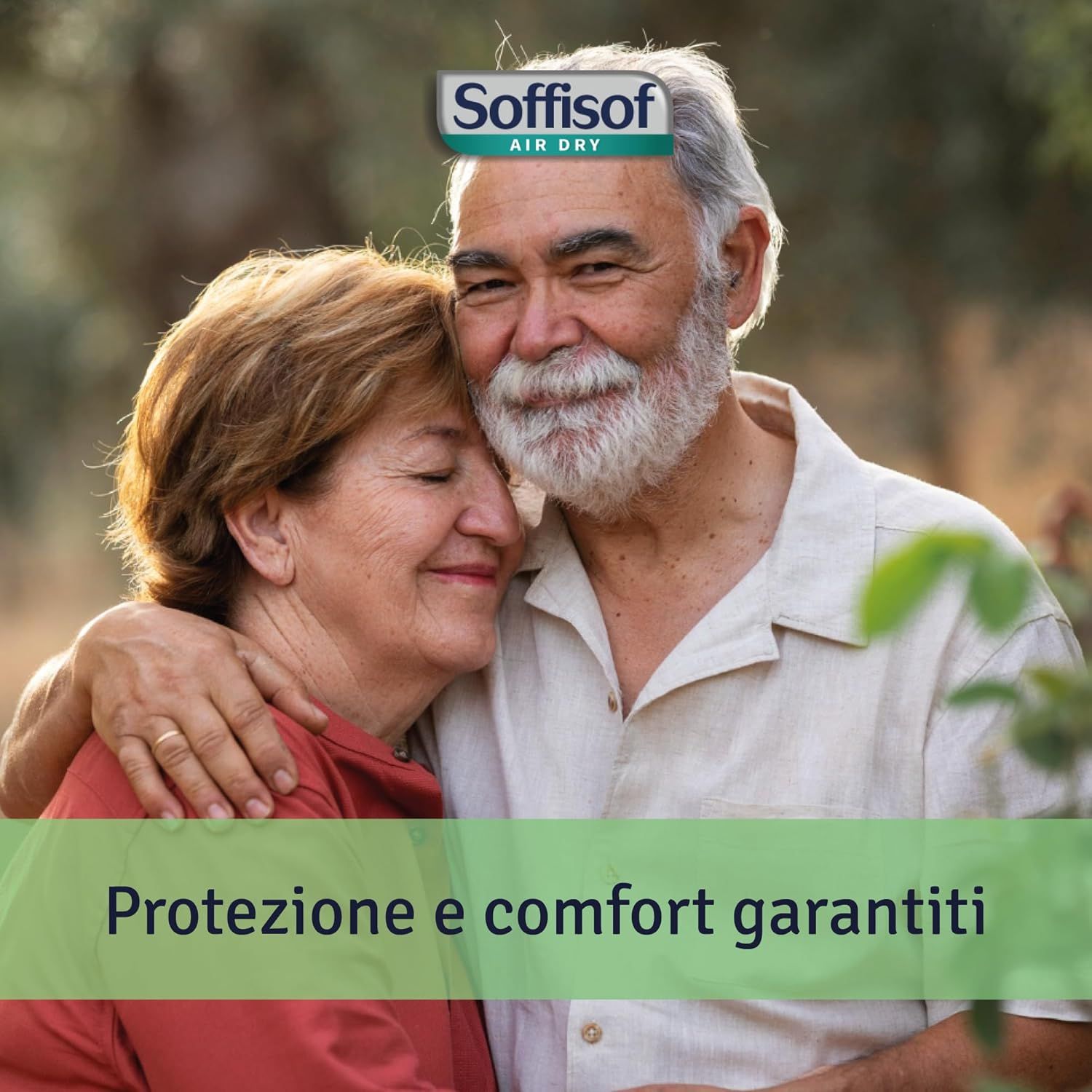 Coppia di anziani che si abbracciano. Testo: Protezione e comfort garantiti. Logo Soffisof.