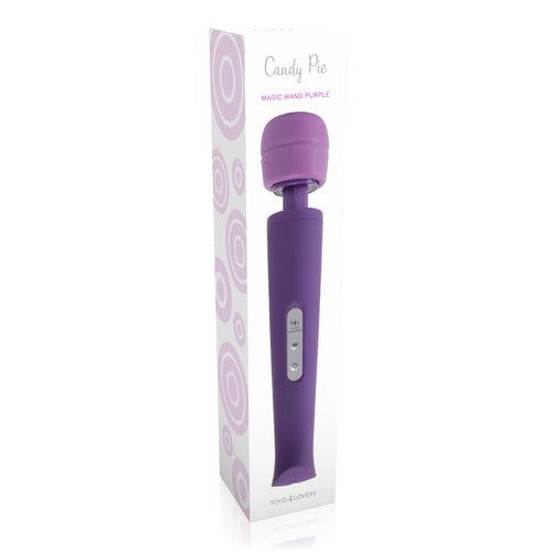 Massaggiatore viola in confezione. Scritta "Candy Pie Magic Wand Purple". Confezione con motivo circolare.