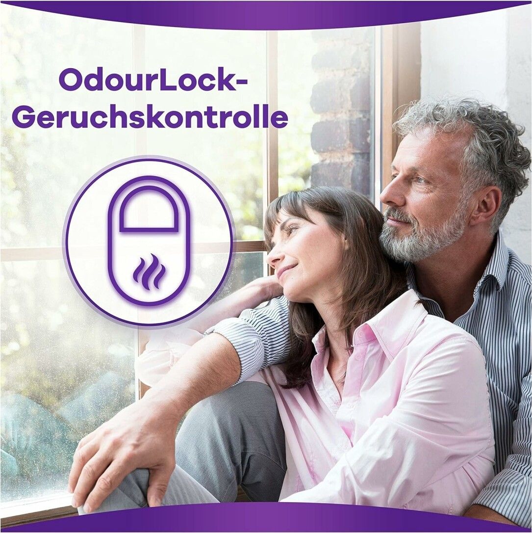 Una coppia seduta vicino alla finestra. Testo: Controllo degli odori OdourLock.