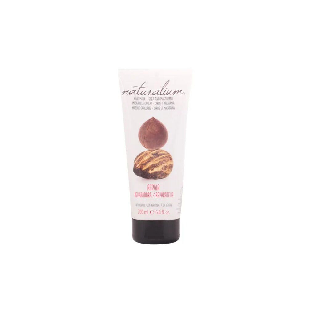 Tubo di maschera per capelli. Scritta: Naturalium, Shea e Macadamia. Illustrazione di noci. Testo: Repair, 200 ml.