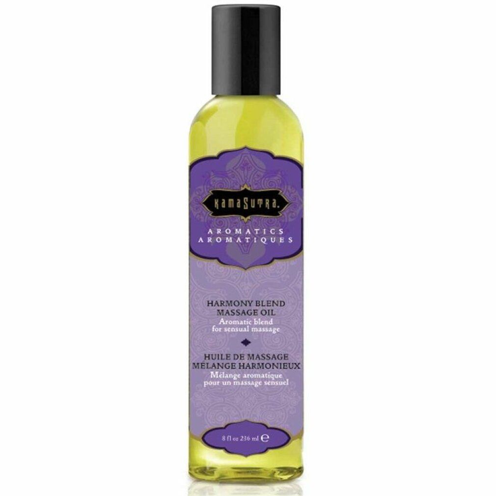 Flacone giallo con tappo nero. Etichetta viola con testo: "Kamasutra Aromatics Harmony Blend Massage Oil". 4 fl oz.