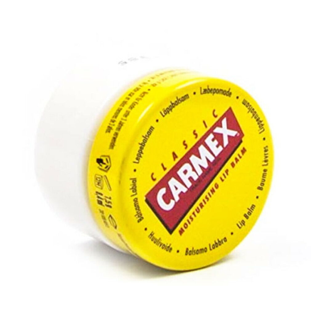 Vasetto bianco con coperchio giallo. Scritta "Carmex Classic Moisturising Lip Balm". Scritte multilingue.