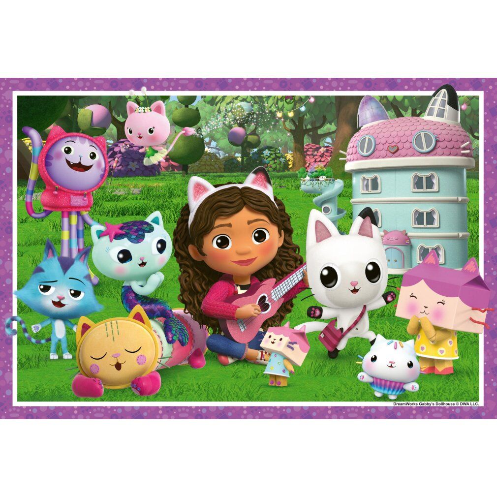 Puzzle con Gabby e personaggi gatto. Cornice viola, erba verde, casa del gatto sullo sfondo. Personaggi con orecchie.