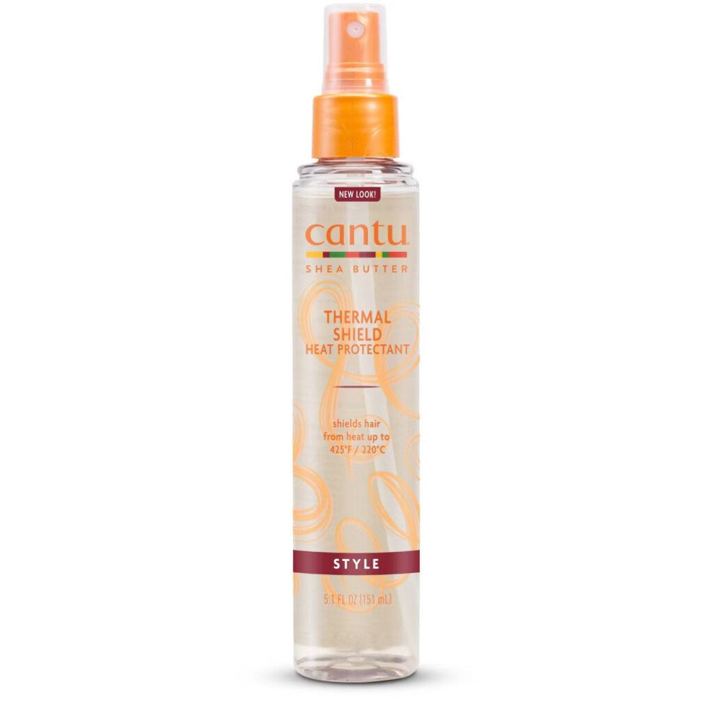 Flacone spray Cantu Thermal Shield. Scritta: "Thermal Shield Heat Protectant". Erogatore arancione. Etichetta "STYLE".