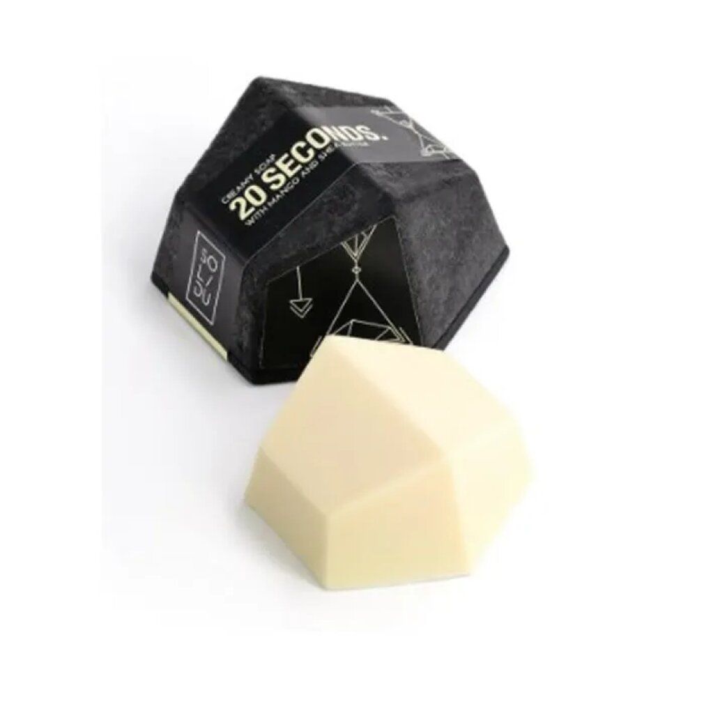 Sapone cremoso beige chiaro, forma geometrica. Confezione nera con testo bianco: 20 SECONDS. Marchio: SOLI DU.