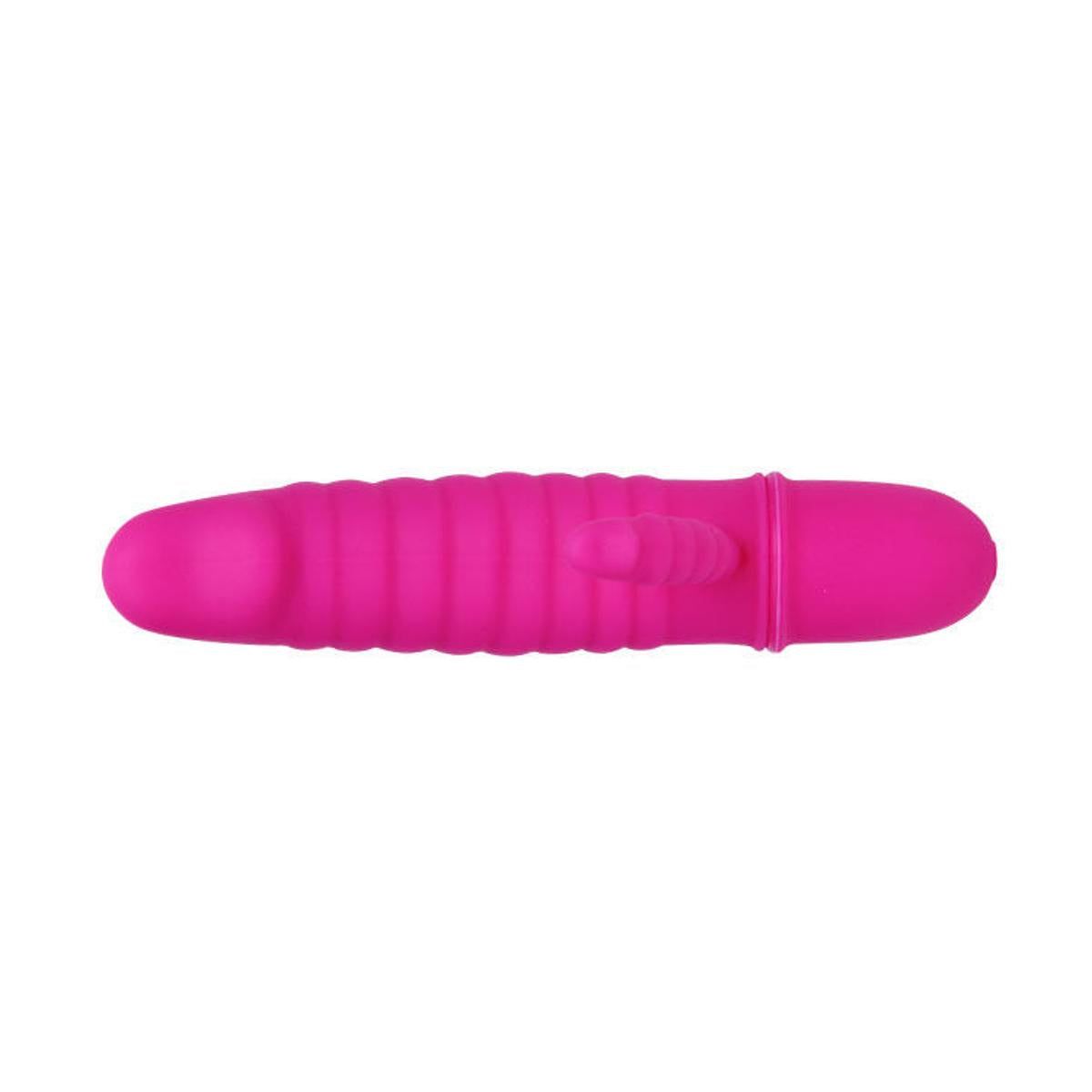 Vibratore rosa con superficie scanalata e stimolatore. Vista dall'alto.