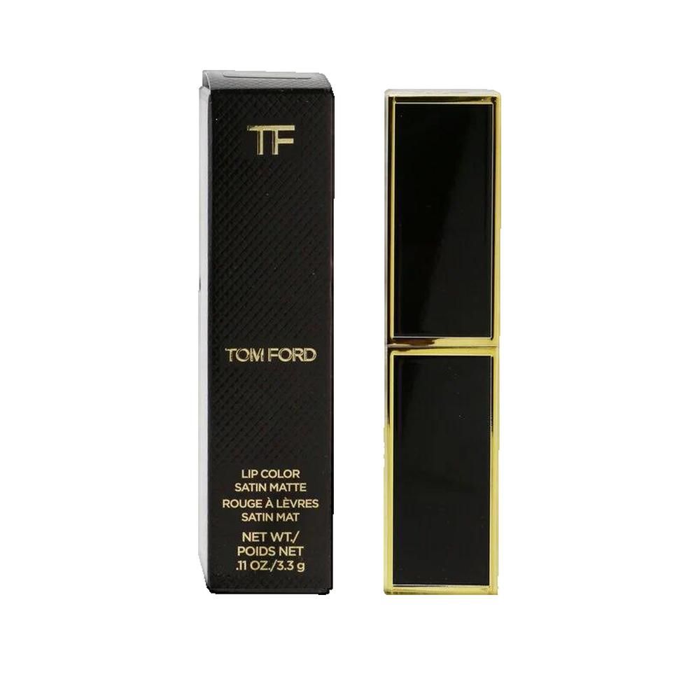 Confezione nera di rossetto con cornice dorata e logo. Accanto, rossetto aperto con custodia dorata.