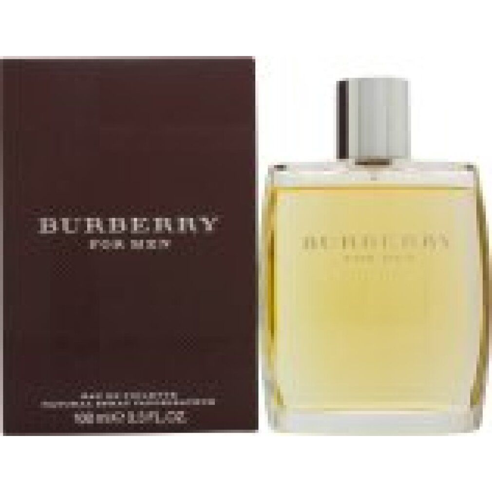 Burberry For Men Eau de Toilette. Confezione marrone con logo. Flacone con tappo argentato. Testo: Burberry, For Men, Eau de Toilette.